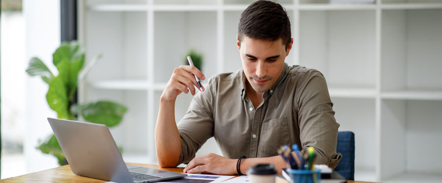 Guy Working on Finances