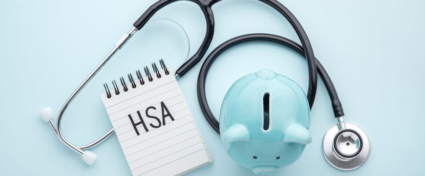 HSA with Piggy Bank and Stethoscope 