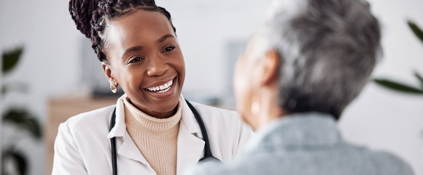 Woman Consulting with Doctor