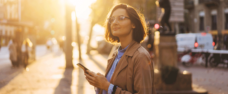 Girl in a Park with her Phone