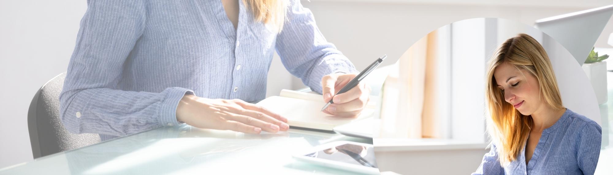 Woman writing accounts